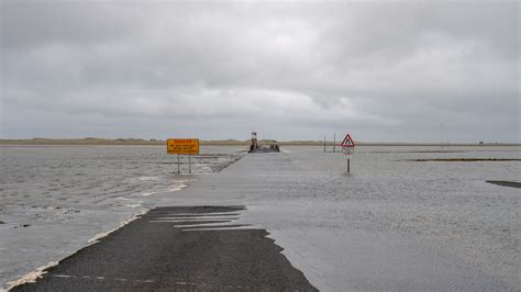 A Holy British Island, Where the Reckless Try to Outrace the Tide - The