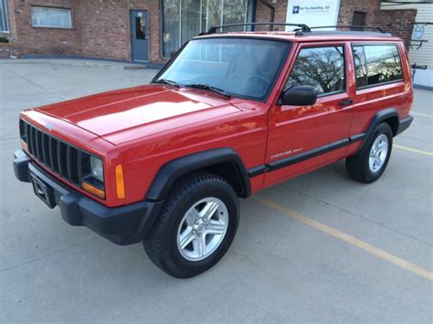 Has the bullet proof 4.0l 6 cyl engine. 1998 JEEP CHEROKEE SPORT RED 2-DOOR, 4X4, 4.0 RUST FREE ...