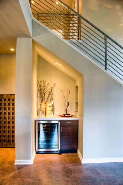 You need to decide what goes under the lowest part of the stair tread and what part of the kitchen needs the coveted space with the most generous headroom. Projects Gallery | Hunter and Company | Interior Design ...