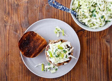 This is a healthy, spicy ground chicken burger topped with smashed avocado and a homemade coleslaw. Ground Chicken Burgers Recipe - Rosemary Apple Chicken Burgers