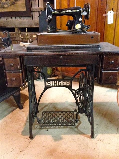 one of our finest singer machines in great condition circa 1940 s antique sewing table