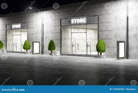 Street With Modern Empty Stores Front With Big Windows At Night Stock