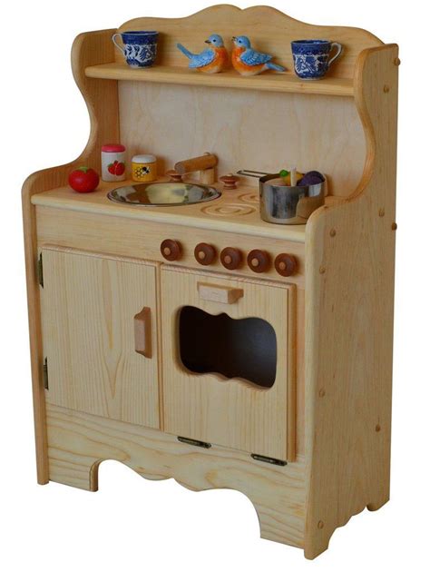 9 cute play kitchens for kids to encourage your little chef. Julianna's Wooden Kitchen | Wooden play kitchen, Wooden ...