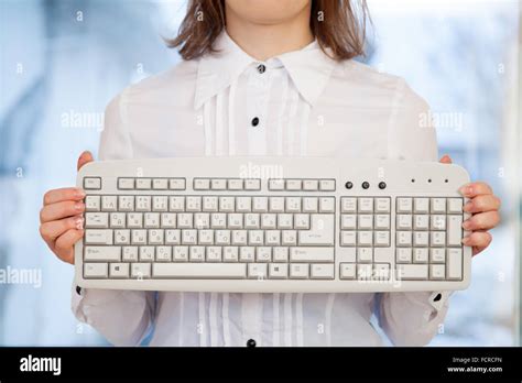 Woman Holding Keyboard Stock Photo Alamy