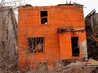 Detroit's Abandoned Houses Painted Tiggerific Orange | Urban Ghosts