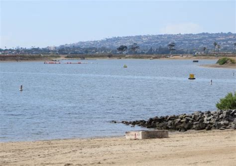 Mission bay comprises 4,200 acres in roughly equal parts of land and water, surrounded by 27 miles of meandering shoreline of sandy beaches. South Shores Park on Mission Bay, San Diego, CA ...