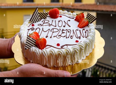 Traditional White Italian Birthday Cake With Congratilations Buon