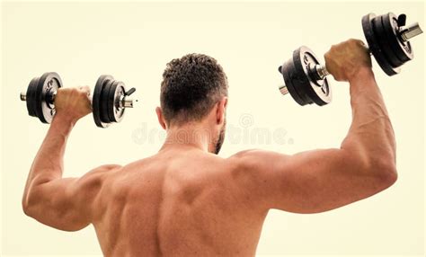 Sportsman With Strong Back And Arms Sport Equipment Bodybuilding