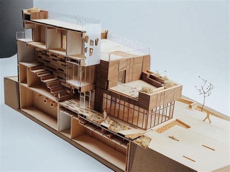 A Model Of A Building Made Out Of Cardboard
