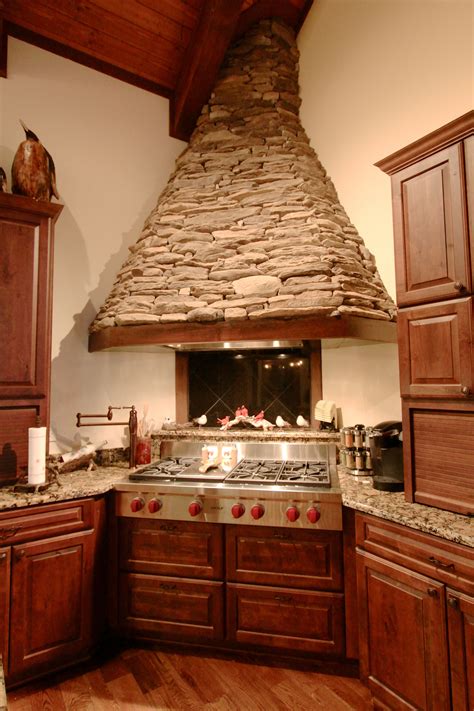 Another company with stone hoods, like we need another one! stacked stone range hood (VPC Builders) | Kitchen design ...