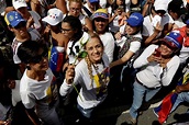 Venezuelan Women Protesters Face Opposition with Roses