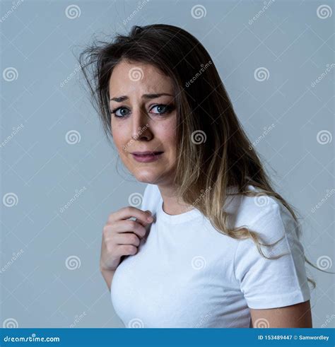 Portrait Of A Young Attractive Woman Looking Scared And Shockedhuman Expressions And Emotions