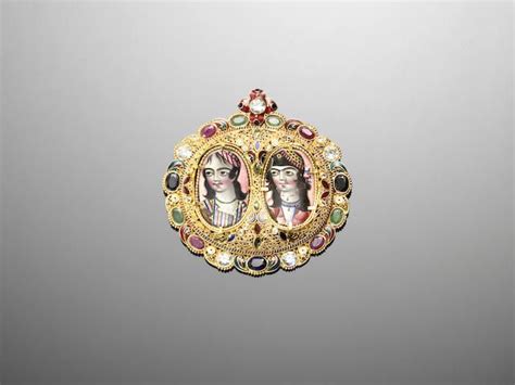 A Gem Set Gold Filigree Pendant Containing Two Qajar Enamelled Portrait