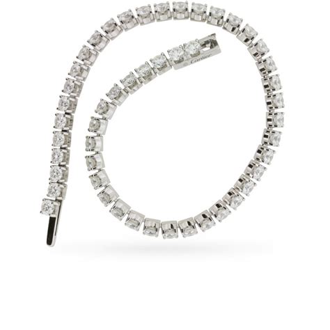 Platinum, sapphire and diamond bracelet, cartier. Cartier 'Essential Lines' 4.68 Carat Diamond Tennis ...