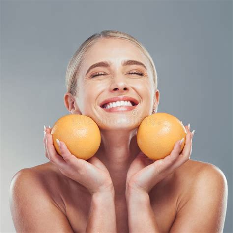 Orange Skincare And Woman In Studio With Fruit For A Natural Beauty Facial Cosmetics Product