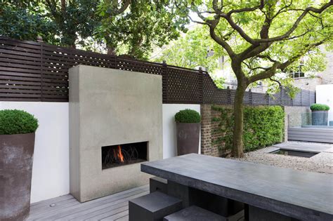 How To Turn Your Patio Into An Oasis Arkitexture Modern Outdoor Fireplace Contemporary