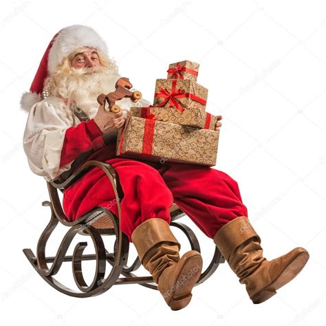Père Noël Assis Dans Un Fauteuil à Bascule Image Libre De Droit Par Hasloo © 54256119