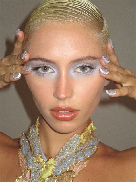 D Nails And Icy Eyes The Details Behind Iris Laws First Met Gala Glam British Vogue Dior