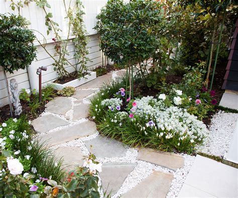 A small indoor courtyard with a single tree and brick and concrete refreshes the look of the interiors and brings a natural feel. This picture-perfect courtyard garden is small in size but ...