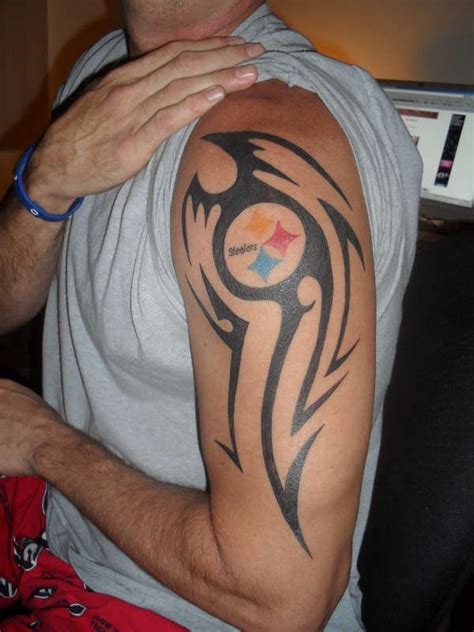 Yellow triangle and yin yang design with logo of pittsburgh steeler tattoo on the arm. Cool Steelers Tattoo | My Steel City {STEELERS} | Pinterest