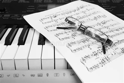 Piano Sheet Music And Glasses Stock Image Image Of