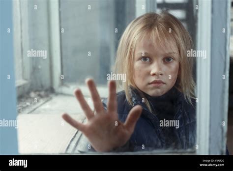 Depressed Poot Girl Standing Near Window Stock Photo Alamy