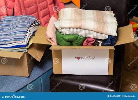 Clothes Donation Box Of Warm Cloth With Donate Label Stock Image