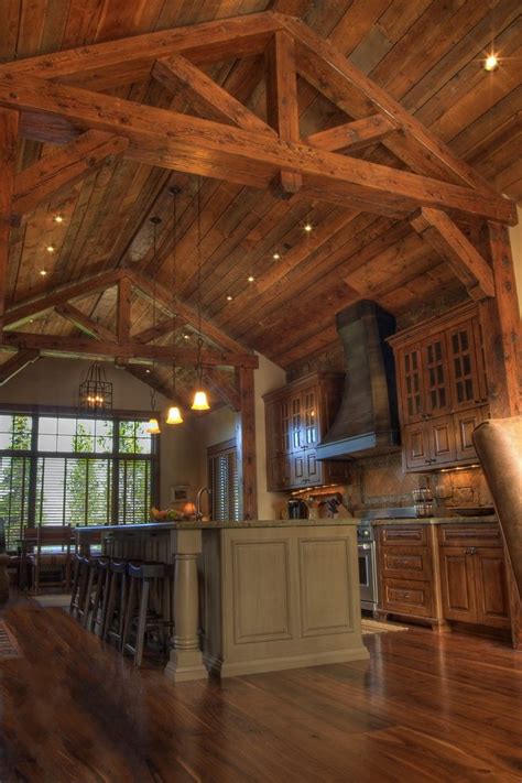 Exposed ceiling trusses adds a stylish visual aesthetic to any living space in your home, making it feel warm and cozy—and very in trend. Ceiling truss kitchen rustic with island traditional wall ...