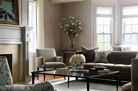 From atmospheric dark grey to light pastel. Gray and Brown Living Room with Glass Coffee Table