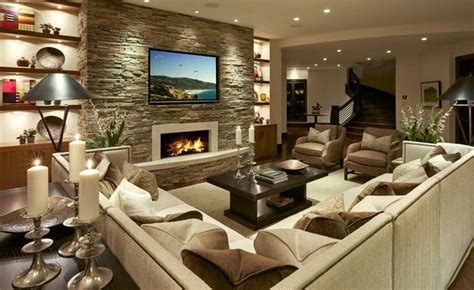 The Stone Accent Wall Creates A Strong Focal Point In This Living Room