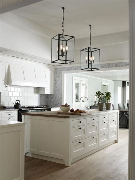 However, incorporating glass into a range hood meant that they had to make room for it. Adding interest to the white kitchen: Hoods - Greige Design
