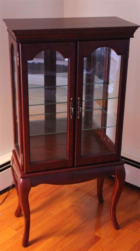 Home products cabinet / hutch and storage queen anne style curio cabinet. Bombay Company Curio Display Cabinet Cherry Finish Queen ...