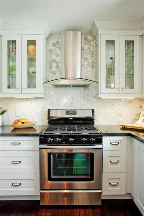 Mosaic tiles comprised of an array of small tiles that form a cohesive and aesthetically appealing collage pattern. Carrara Marble Hexagon Tile - Contemporary - kitchen ...