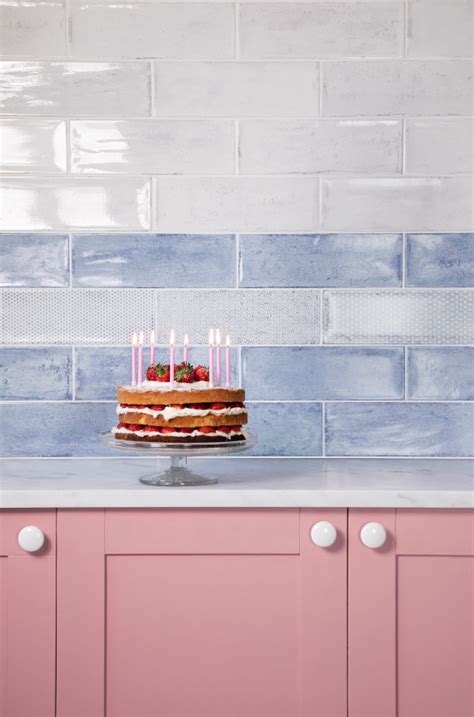 Combine Our Blue Arles Tiles With Pink Cabinetry For A Statement