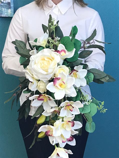Check spelling or type a new query. Real Touch Cascading Orchid Silk Bouquet-Orchids and Rose ...