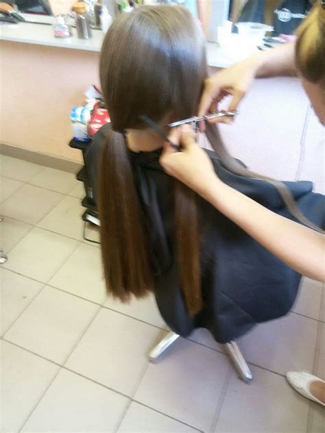 Start cutting his hair in sections. Pin on scissors