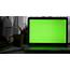 Laptop With Green Screen Dark Office Perfect To Put Your Own Image Or 