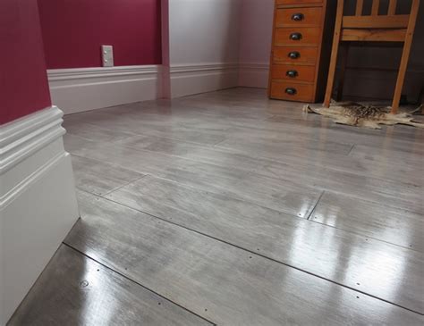 Since i skipped the primer, this room took about 1 1/2 gallons of paint. DIY Plywood Plank Floors | Centsational Girl