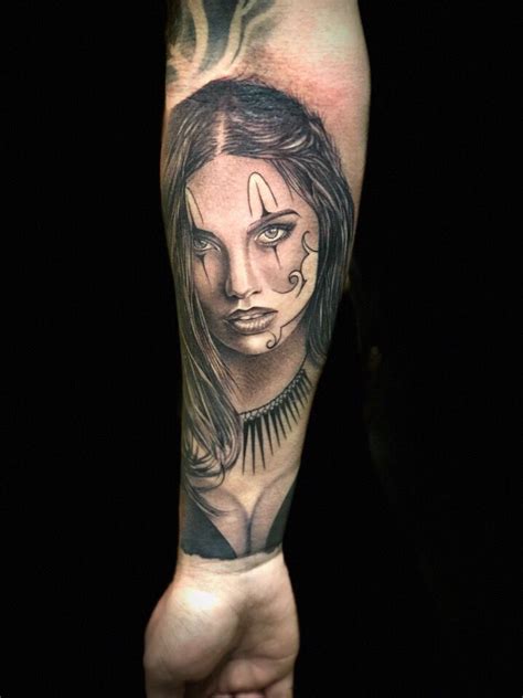 It also features a ribbon with two hearts sitting on top of her foot. Adriana Lima tattoo Chicano