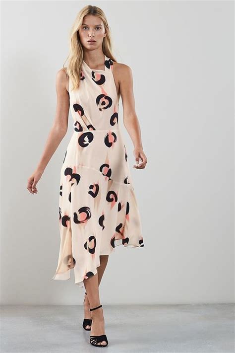 Maternity midi tea dress with godets in floral print, $60, asos.com. Wedding guest dresses - the best wedding guest outfit ...