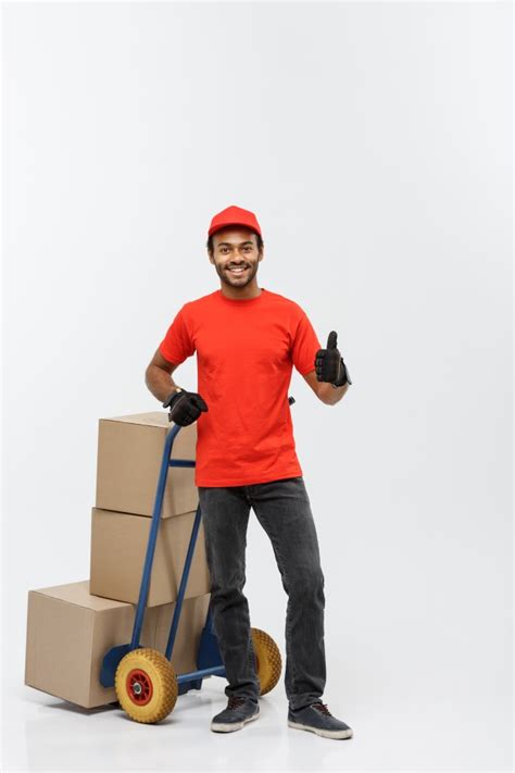 5753 фразы в 215 тематиках. Delivery concept - portrait of handsome african american delivery man or courier pushing hand ...