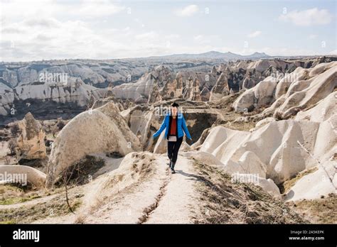 Woman Hiking In Rocky Valley Göreme Cappadocia Nevsehir Turkey