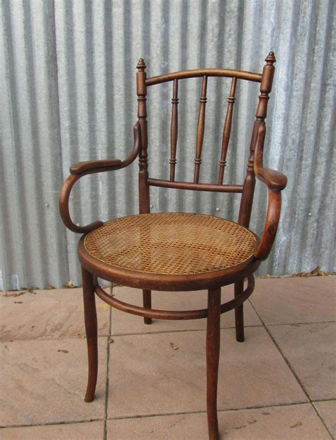 Each cross back chair features a solid elmwood construction with a sturdy bentwood back. Austrian Bentwood & Cane Armchair from Josef Hofmann ...