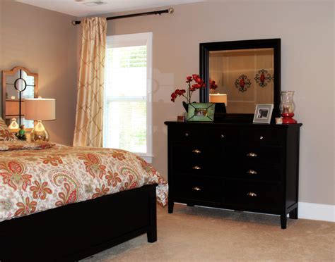 A separate sitting area by the windows a large master bedroom can be a great bonus in a home. Transitional Master Bedroom Makeover in Hampstead, NC - A ...