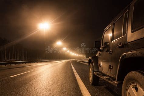 Jeep Wrangler Night On A Deserted Road In The Leningrad Region Stock