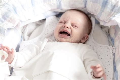 Baby Girl Crying In Her Crib Stock Photo Image Of Newborn Cradle