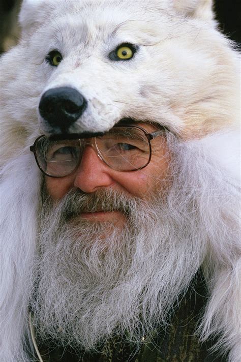 A Man Wearing A Fur Wolf Hat Photograph By Cary Anderson Pixels