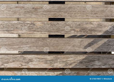 Wooden Planks Are Stacked Together To Form A Wall With Horizontal
