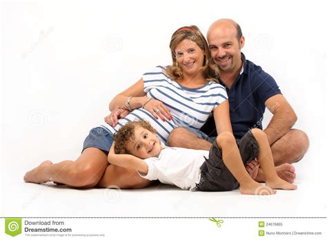 Familia Feliz Junto Con Mujer Embarazada Imagen De Archivo Imagen De