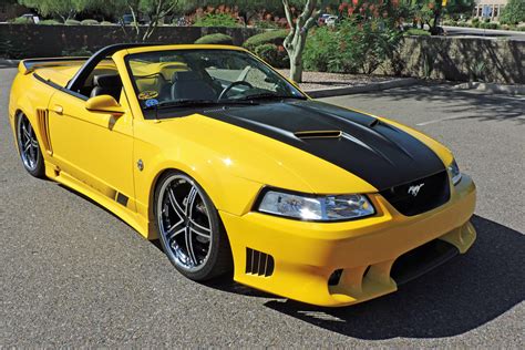 The stereo still has miniscule buttons. 1999 FORD MUSTANG GT CUSTOM CONVERTIBLE - 191178